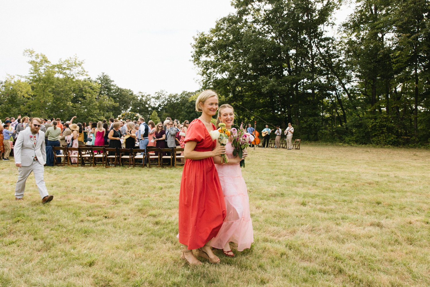 Wedding party leaving the ceremony in Maine